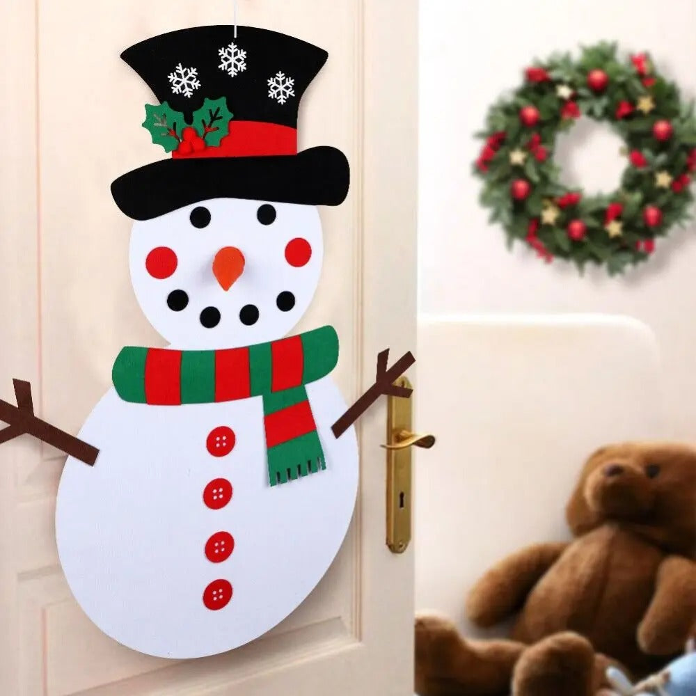 Les enfants créent leur propre Bonhomme de Neige de Noël.